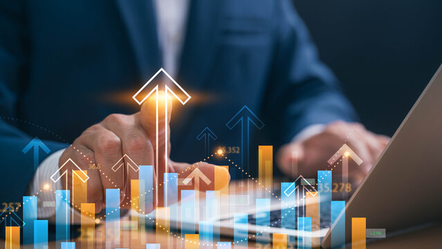 Financial growth and investment success, A businessman touches a digital financial chart with rising bar graphs and upward arrows, representing economic progress, business strategy, and market trends