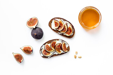 Fig sandwiches with cheese and honey for breakfast. Top view