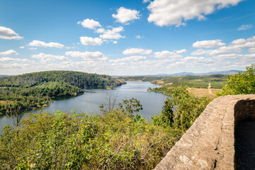 The Rotestein viewpoint (Harz Mountains, Germany) offers a nice view over the Rappbode reservoir. It's located near the town of Hasselfelde. In good weather conditions you can see the Brocken.