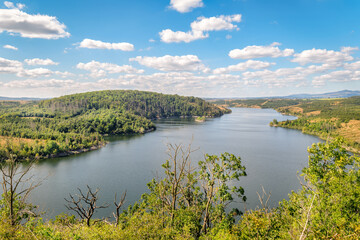 The Rotestein viewpoint (Harz Mountains, Germany) offers a nice view over the Rappbode reservoir. It's located near the town of Hasselfelde. In good weather conditions you can see the Brocken.