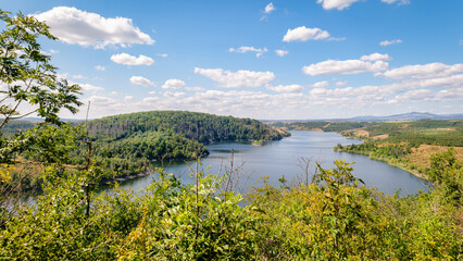 The Rotestein viewpoint (Harz Mountains, Germany) offers a nice view over the Rappbode reservoir. It's located near the town of Hasselfelde. In good weather conditions you can see the Brocken.