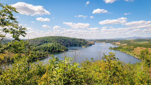 The Rotestein viewpoint (Harz Mountains, Germany) offers a nice view over the Rappbode reservoir. It's located near the town of Hasselfelde. In good weather conditions you can see the Brocken.