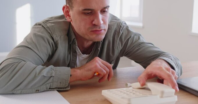 Man worry and frustration at home, thinking pondering, anxious unhappy about phone call, suffering from problems, long waiting for office call, unable to change, make decision, less confident 