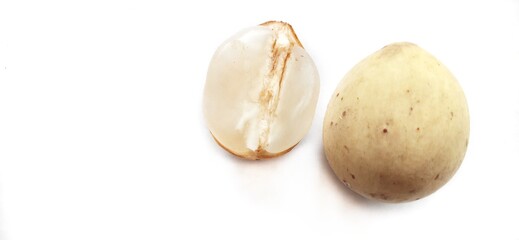Sweet duku or langsat fruits isolated on white background