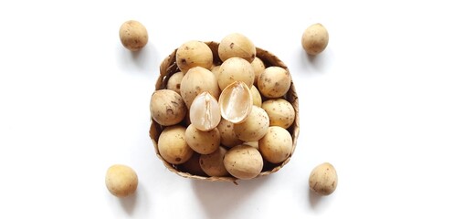Sweet duku or langsat fruits isolated on white background