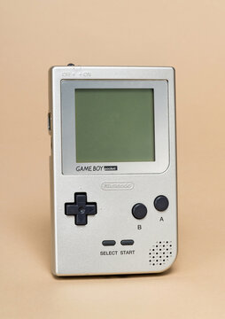 Pavia, Lombardy, Italy - December 27, 2024: Nintendo Game Boy Pocket portable game console, 1996 at Ctrl+Alt Museum. Game Boy Pocket used two AAA batteries