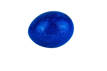 Vibrant ultramarine blue easter egg with  glowing shell pattern, isolated on white background. Color contrast, creativity, holiday decoration, symbolism of rebirth. Copy space. Selective focus
