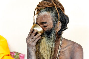 naga hindu saint in sacred trance during mahakumbh festival