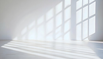 Obraz premium Sunlit empty room, minimalist interior design, white walls, wooden floor, light and shadow play.