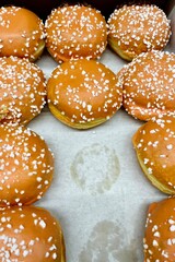 lots of donuts sprinkled with white chocolate chips. calories.