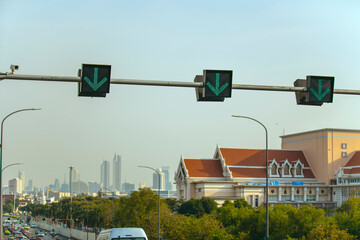 Bangkok City scape with Green Arrow Traffic Lights Guiding the Flow