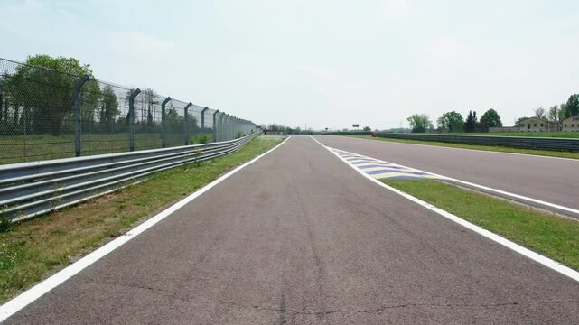 Aerial view shot of racetrack with markings for motorsport, large autodrome for sport leisure activity and competitions