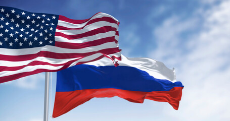 Three national flags of Russia waving in the wind on a clear day