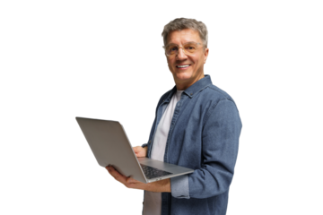 Older man smiles while holding laptop, showcasing technology skills in a modern setting