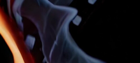 Filmstrip igniting with intense flames and smoke transformation - Powered by Adobe