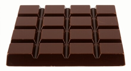 Obraz premium Pieces of dark chocolate isolated on white background.