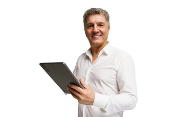Smiling middle-aged man holding tablet and engaging with technology indoors