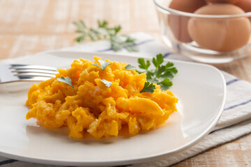 Close up Scrambled eggs in white plate.for healthy breakfast,simple food.