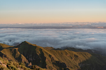 Sunset with clouds and mountains.