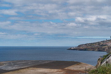 Airplane landing on the island of madeira.