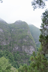 View over the hills and green mountains of Madeira. 