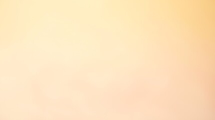 A beautiful sunset sky with a smooth gradient transitioning from warm yellow to soft pink hues, casting a calm glow.