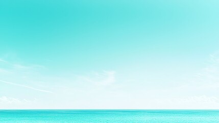 Obraz premium A crisp and clear azure sky with faint wisps of thin clouds drifting lazily, offering a calm and refreshing view of the sky.