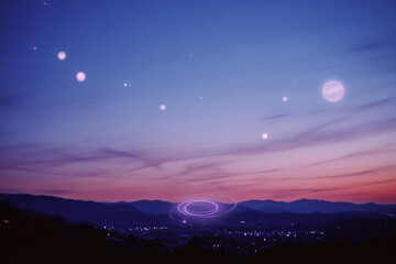 a night sky with a few circles of light