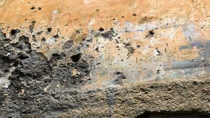 Wall destroyed by bullets and war. Ideal for texture, pattern and background.