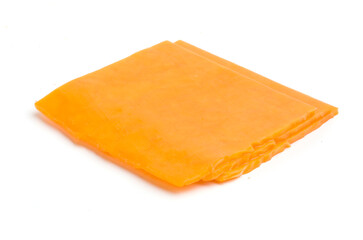 pieces of cheddar cheese on white background