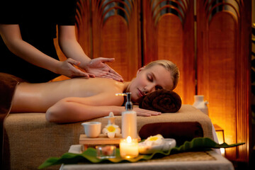 Aromatherapy massage ambiance or spa salon composition setup with focus decor candles and spa...