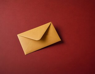 A simple yellow envelope resting on a deep red background, symbolizing communication and connection.