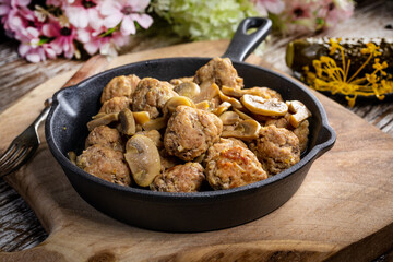 Meatballs served with pickled cucumber.