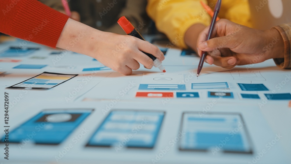 Poster a diverse group collaborates on user interface design for a mobile application, using markers and sk