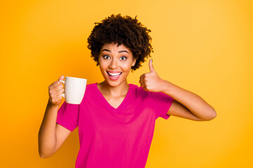 Photo of cheerful curly wavy trendy charming cute nice sweet black lady recommending you to taste...