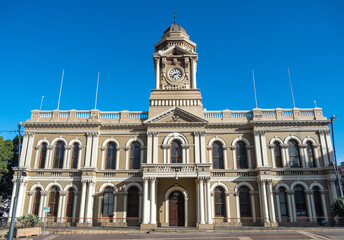 Fototapeta premium South Africa. Port Elizabeth Gqeberha City Hall. Historic building with a clock tower in Market Square.