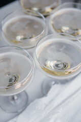Welcome drink alcoholic beverage in glasses on the table for guests