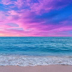 Obraz premium Pastel sunset over calm ocean with pink sky and blue water at beach