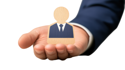 Businessman in suit holding a wooden mannequin, visual representation of mentoring, guidance and potential
