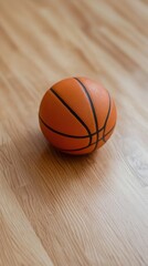 Obraz premium Basketball on wooden floor