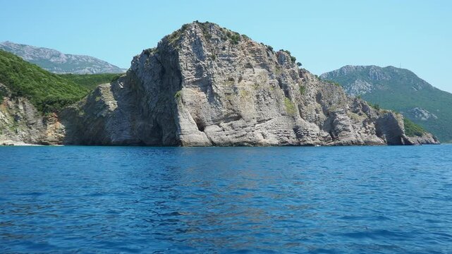 Vasilina Pecina cave, beach Tri Kralja Three kings, beach Kraljicina King beach Bar Montenegro. Hills, inaccessible rocks. Flysch, marine sedimentary rocks, lithological layers. Adriatic Mediterranean