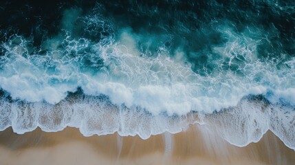 Fototapeta premium Ocean waves crashing on sandy beach