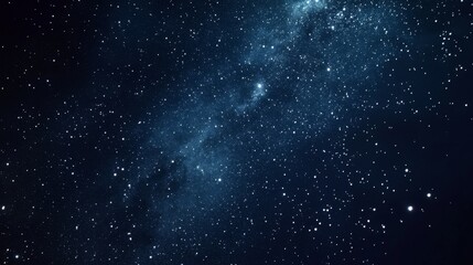 Stars and constellations dot a vast, deep blue sky, evoking wonder and infinite possibilities in this cosmic night scene.