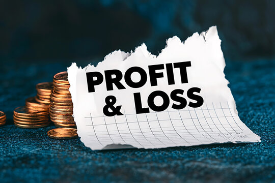 Profit and Loss Concept: Financial statement with gold coin stacks beside a piece of paper with profit and loss calculations.