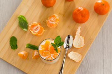Refreshing dessert with tangerines and yogurt