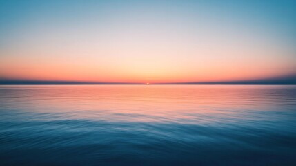 Fototapeta premium Brilliant sunset dissolves into the sea, merging vibrant hues of orange and pink in a seamless horizon of peace and vastness.