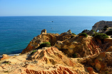 walking path with breathtaking views through the coast from porches to benagil caves lagoa algarve...
