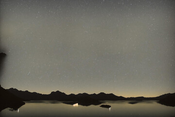 The Black River and Mountains Beneath the Veil of Night
