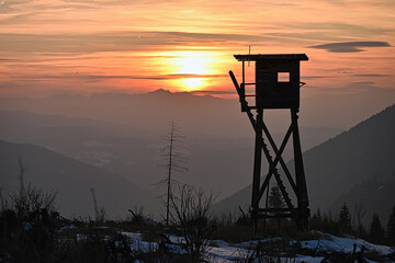 Hunting stand in the sunset in the Alps.
