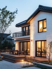 Fototapeta premium Modern house showcases a beautiful exterior lit at dusk